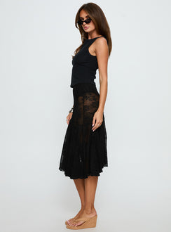   side view of model wearing Princess Polly Mellissa Sheer Textured Midi Skirt Black 