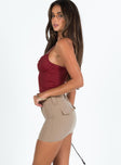 Mini skirt Belt looped waist Zip and button fastening  Faux back pockets