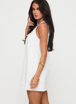 side view of model wearing Princess Polly Alanah Mini Dress White Square Neck 