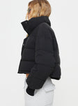 Puffer jacket Snap button fastening at front, mock neck, ribbed cuffs, adjustable drawstring around waist Non-stretch, fully lined Princess Polly Lower Impact 