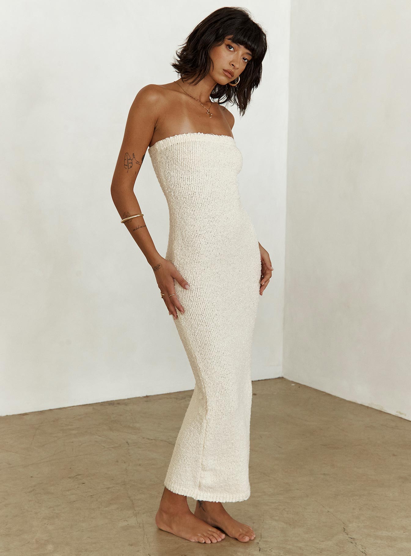 side view of model wearing Princess Polly Cloud Strapless Boucle Maxi Dress Cream Straight Neck 