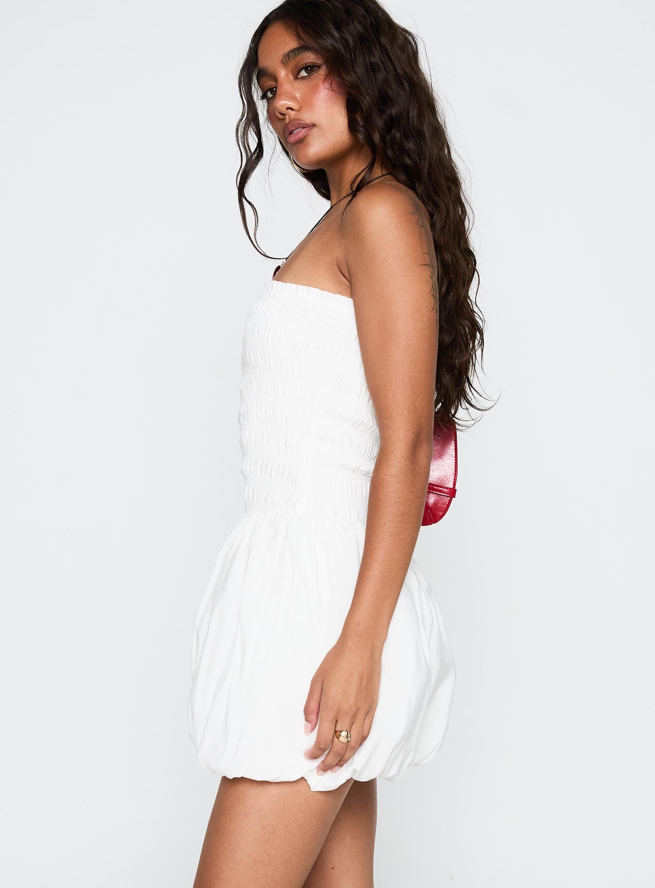 side view of model wearing Princess Polly Anemone Bubble Hem Mini Dress White Straight Neck 