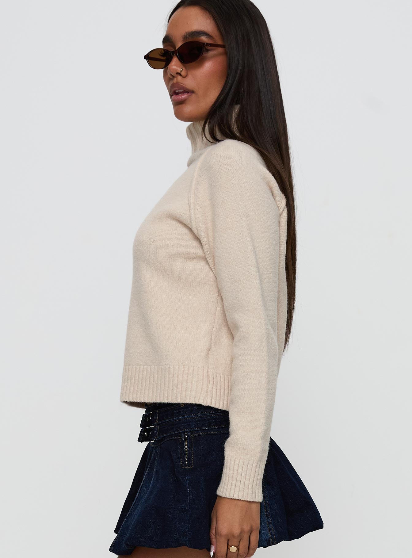 side view of model wearing Princess Polly Enrica Funnel Neck Knit Sweater Cream Cropped 