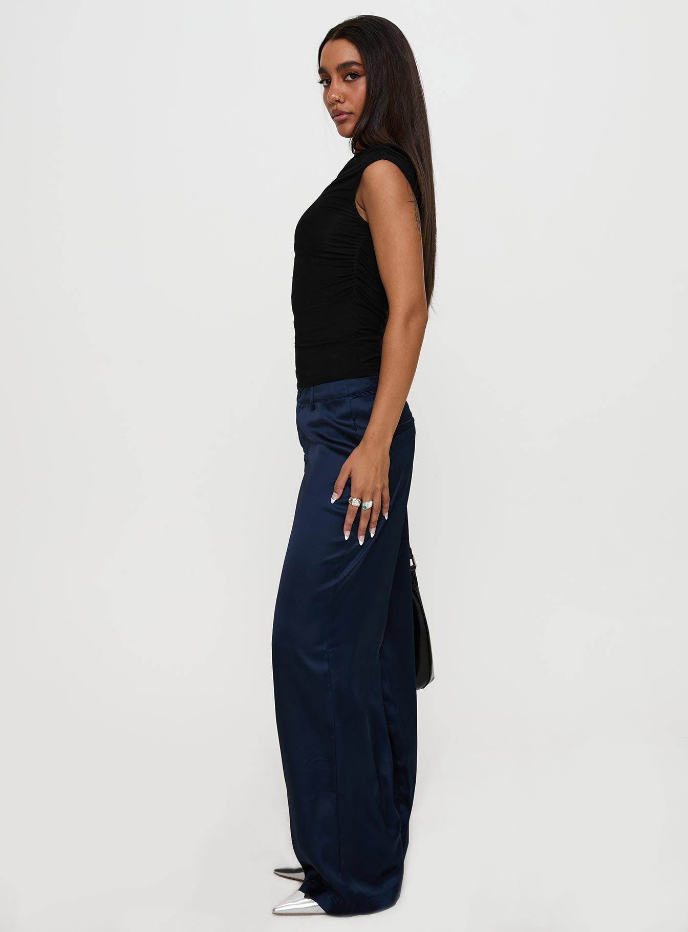 side view of model wearing Princess Polly Alaina Pants Navy High Waisted Pants 