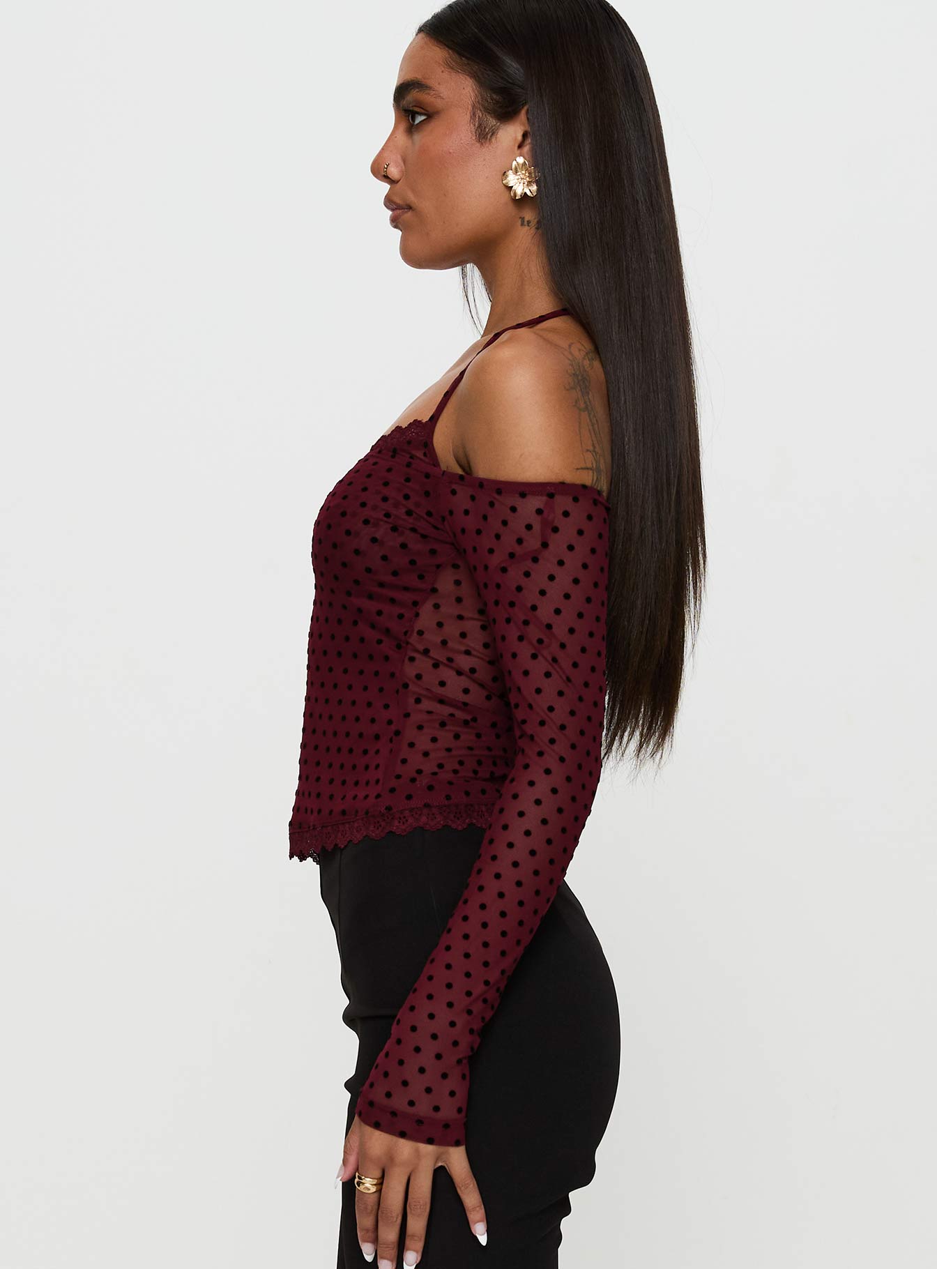 side view of model wearing Princess Polly On My Side Off Shoulder Tie Neck Top Burgundy Full Sleeves straight 
