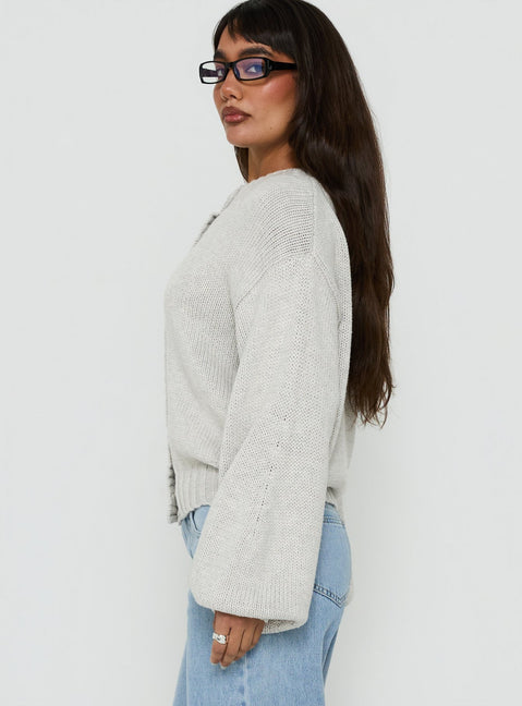 Crafted with Edern Cardigan Light Grey Marle womens-jumpers featuring short oversized fit side view of model wearing