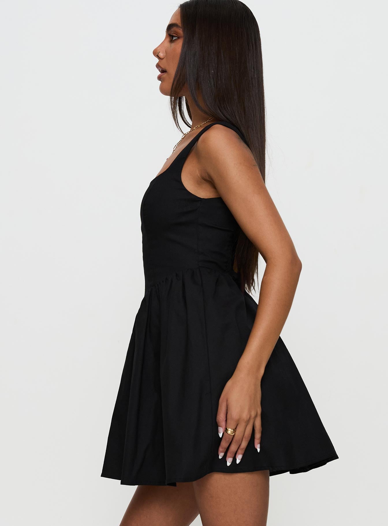 side view of model wearing Princess Polly Martie Mini Dress Black Square Neck 