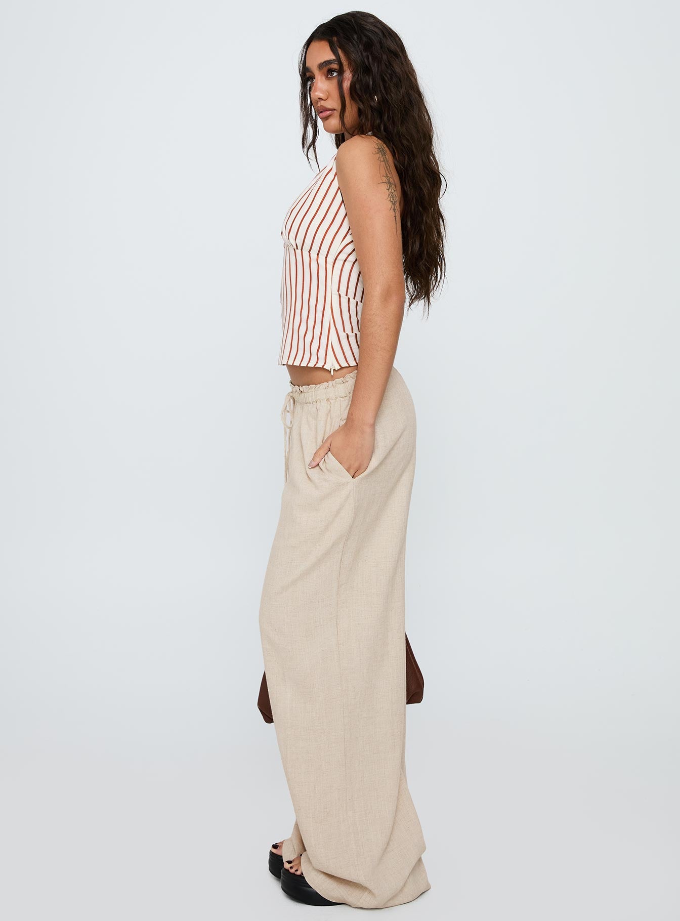 side view of model wearing Princess Polly Seascape Oversize Tie Pants Natural High Waisted Pants 