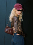 side view of model wearing Princess Polly Uzo Long Sleeve Top Leopard Full Sleeves High Neck 