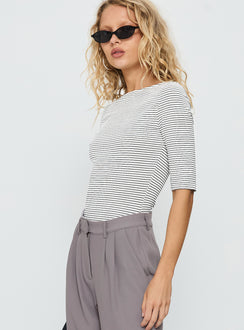 side view of model wearing Princess Polly Here One Moment 3/4 Sleeve Bodysuit Black / White Stripe Half Sleeve 