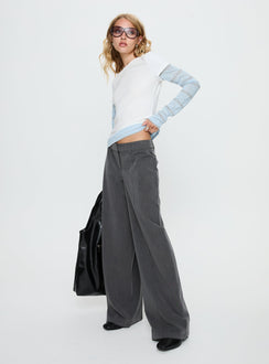 side view of model wearing Princess Polly Sarito Low Rise Straight Leg Pants Grey Mid Rise Pants 