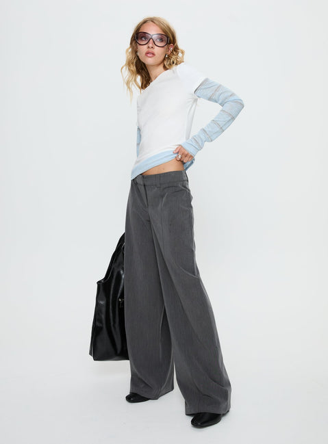 side view of model wearing Princess Polly Sarito Low Rise Straight Leg Pants Grey Mid Rise Pants 
