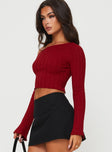 side view of model wearing Princess Polly Santorini Knit Top Red Full Sleeves Asymmetric Neckline 