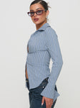 side view of model wearing Princess Polly Madlin Long Sleeve Top Blue Stripe Full Sleeves V-Neck 