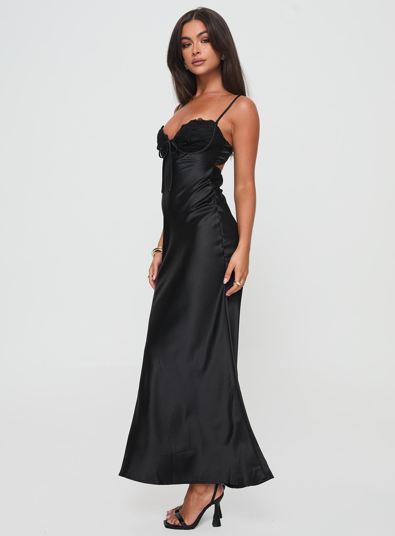 side view of model wearing Princess Polly Fadyen Bias Cut Maxi Dress Black Tall Sweetheart Neckline 