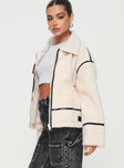 Cream shearling jacket Classic collar, exposed zip fastening, twin pockets, faux leather stitching, buckle detail