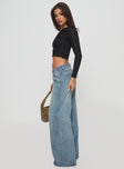 side view of model wearing Princess Polly Demie Distressed Detail Wide Leg Jean Light Wash Low Rise Jeans 