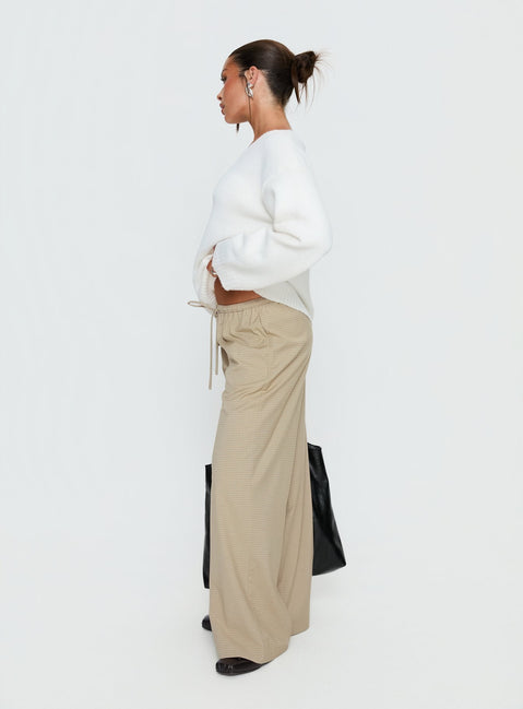 side view of model wearing Princess Polly Ketrina Tie Waist Pants Beige Plaid Mid Rise Pants 