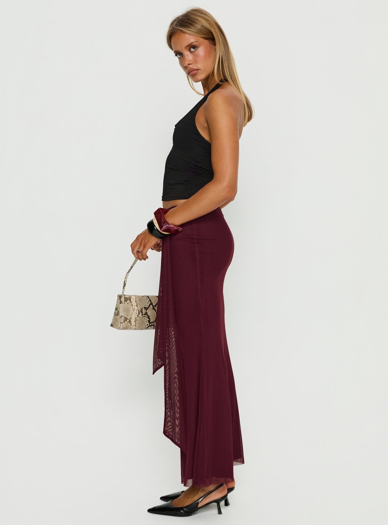   side view of model wearing Princess Polly Caviar Tie Maxi Skirt Currant Maxi Skirts 