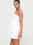 side view of model wearing Princess Polly Ortega Mini Dress White Petite Square Neck 