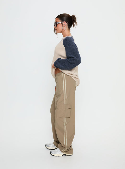 side view of model wearing Princess Polly Ellyn Baggy Cargo Pants Khaki Mid Rise Pants 