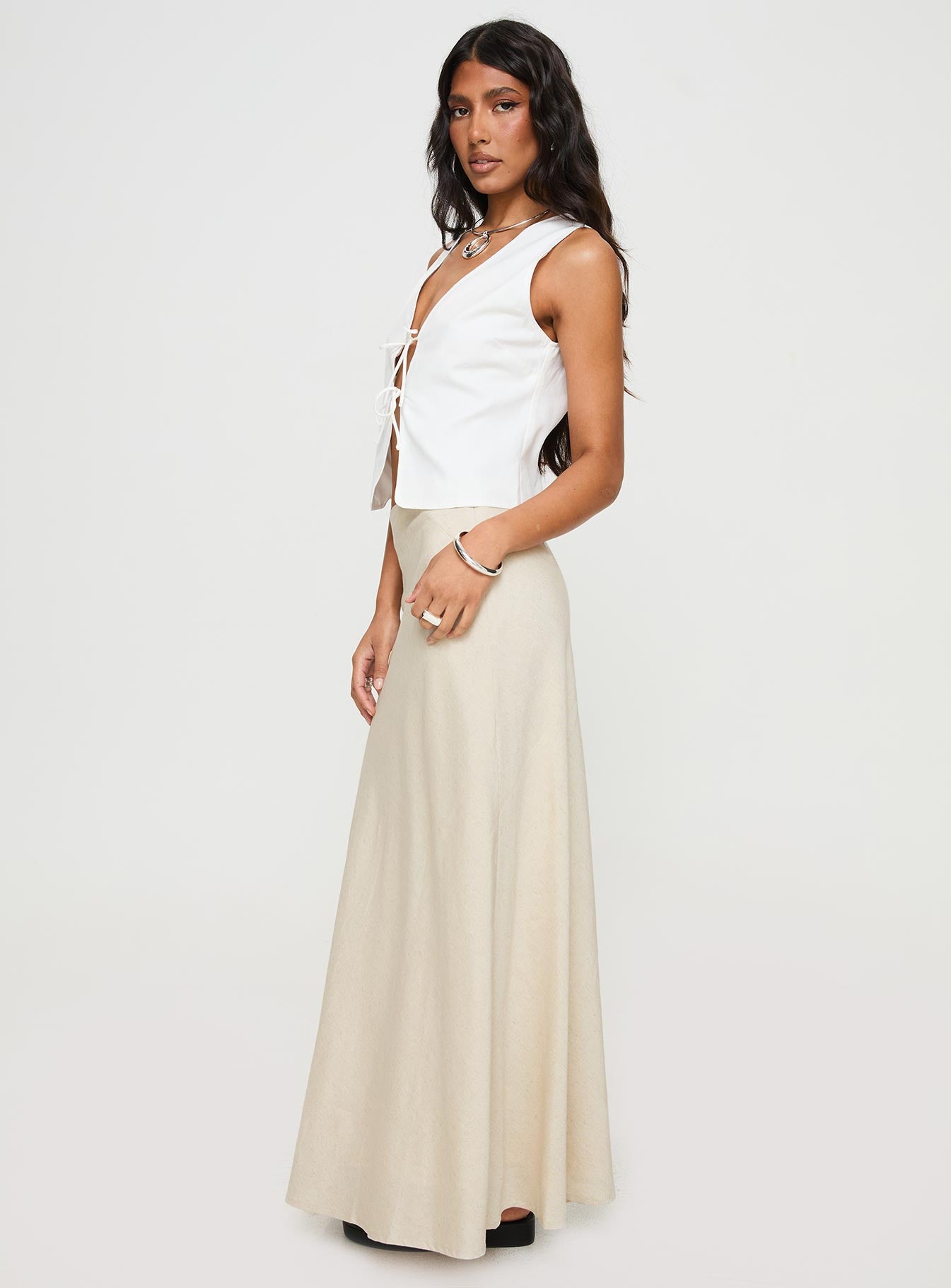 back view of model wearing Princess Polly All In Maxi Skirt Beige Maxi 