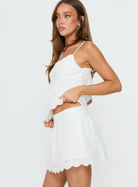   side view of model wearing Princess Polly Tiriah Embroidered Mini Skirt White Mini Skirts 