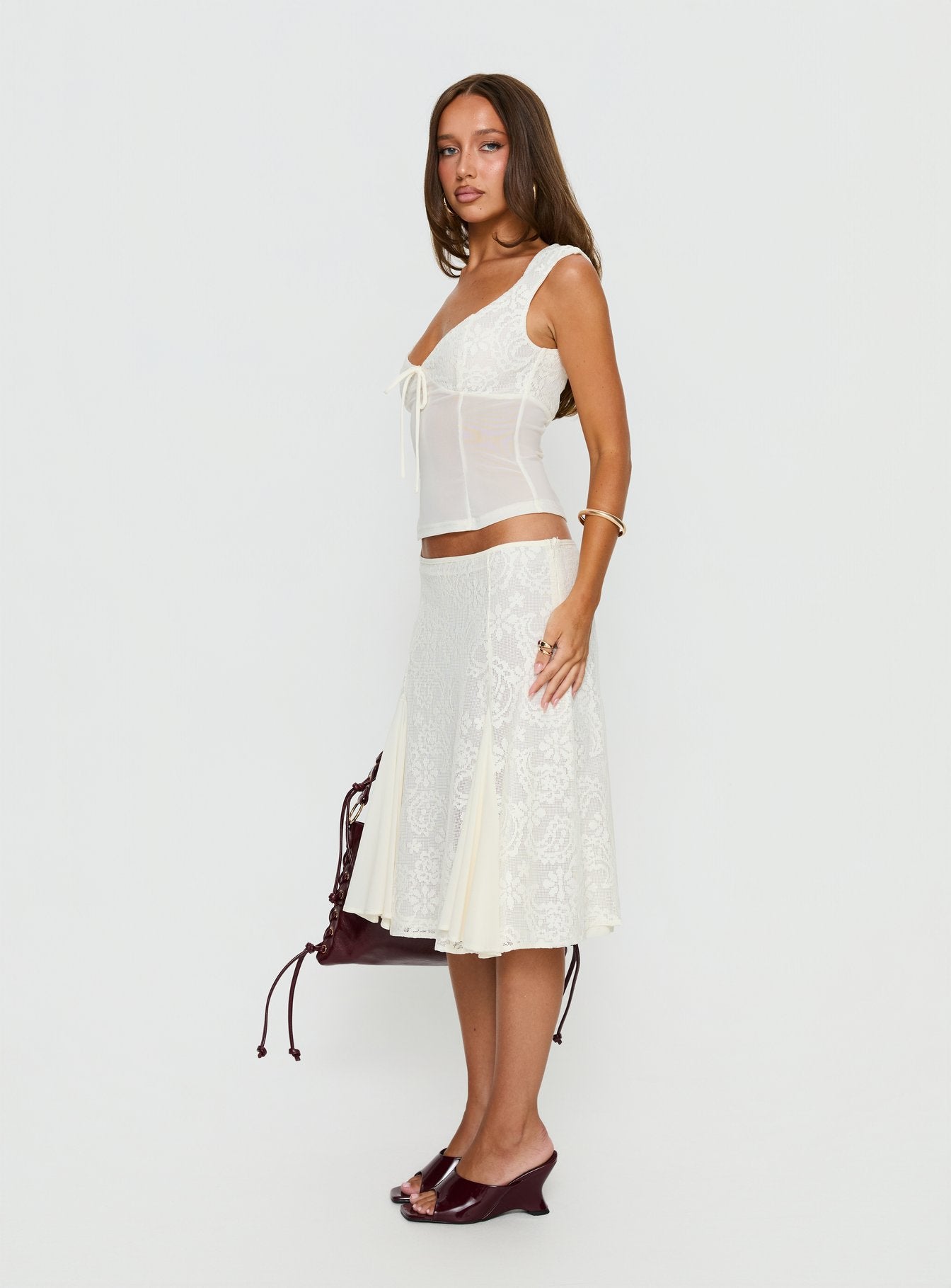   side view of model wearing Princess Polly Quani Lace Midi Skirt Cream Midi Skirts 