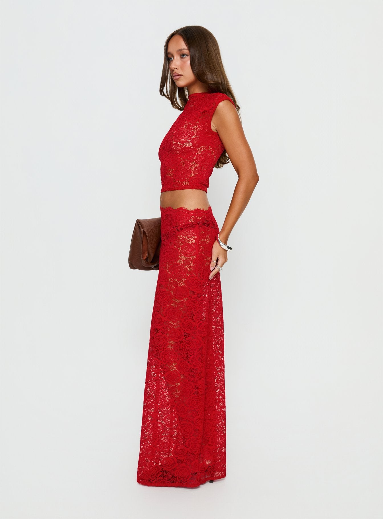   side view of model wearing Princess Polly Vionna Lace Maxi Skirt Red Maxi Skirts 