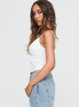 side view of model wearing Princess Polly Plantain Top White Sleeveless V-Neck 