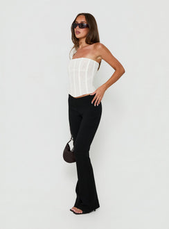 Featuring the Zeni V Waist Bootleg Pants Black womens-regular-pants in mid-rise side view of model wearing