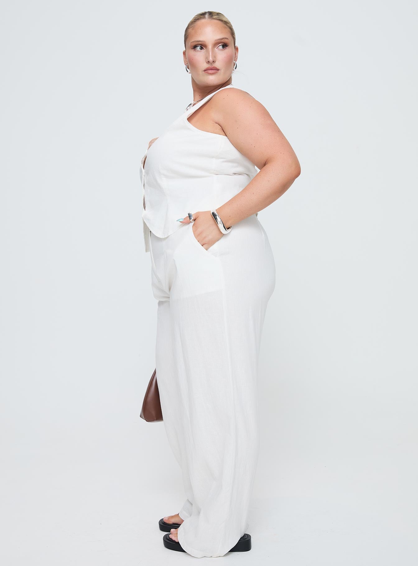 side view of model wearing Princess Polly Sofi Pants Natural Curve High Waisted Pants 