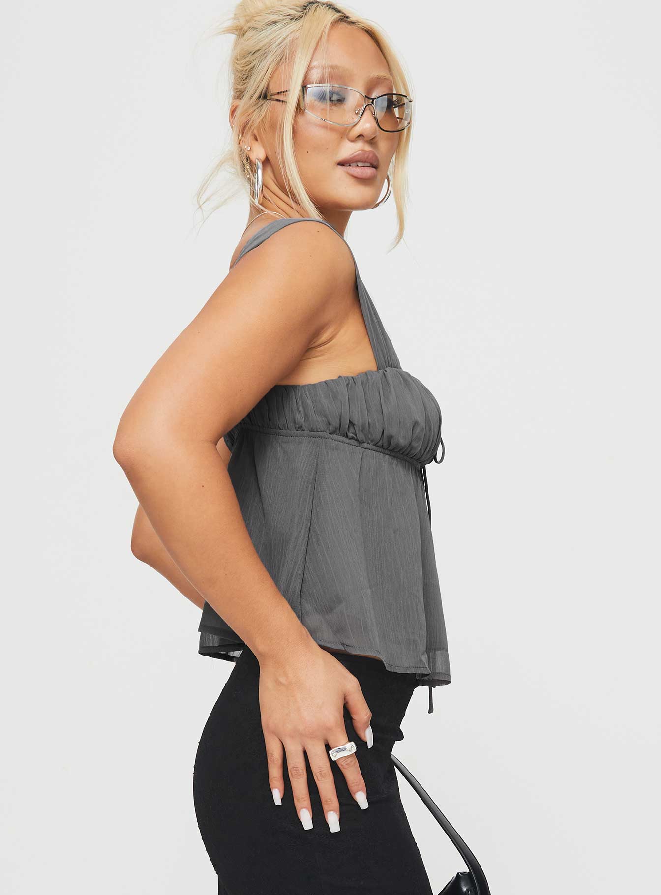 side view of model wearing Princess Polly Mooney Top Slate Grey Sleeveless Square Neck 