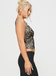 side view of model wearing Princess Polly Honeymoon Stage Top Leopard Sleeveless V-Neck 