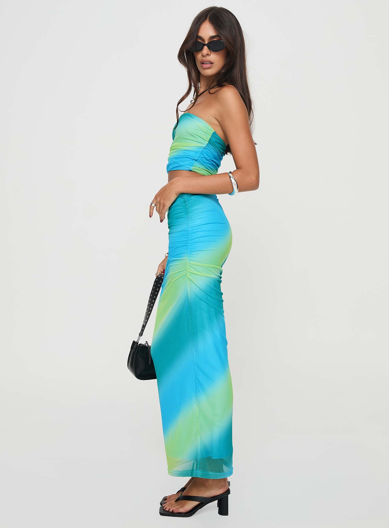 Two piece mesh set Tube top, ruched sides, inner silicone strip at bust Maxi skirt, thin elasticated waistband, ruching down sides Good stretch, fully lined