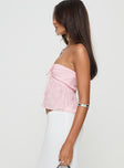 Strapless top Tie fastening at bust, shirred back panel, split hem Non-stretch material, lined bust