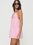 side view of model wearing Princess Polly Nicoletta Mini Dress Light Pink Petite Plunger 