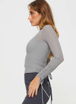 side view of model wearing Princess Polly Kailee Long Sleeve Top Grey Full Sleeves Crew Neck 