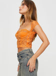 Lace crop top Cap sleeve, sweetheart neckline, wired cups, invisible zip fastening at side Good stretch, lined bust