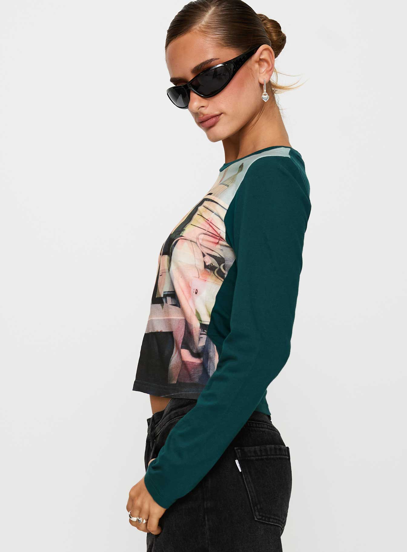 side view of model wearing Princess Polly Sonique Long Sleeve Top Multi Full Sleeves Crew Neck 