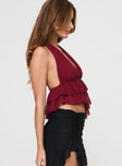 side view of model wearing Princess Polly Philomela Top Burgundy Sleeveless Plunger 