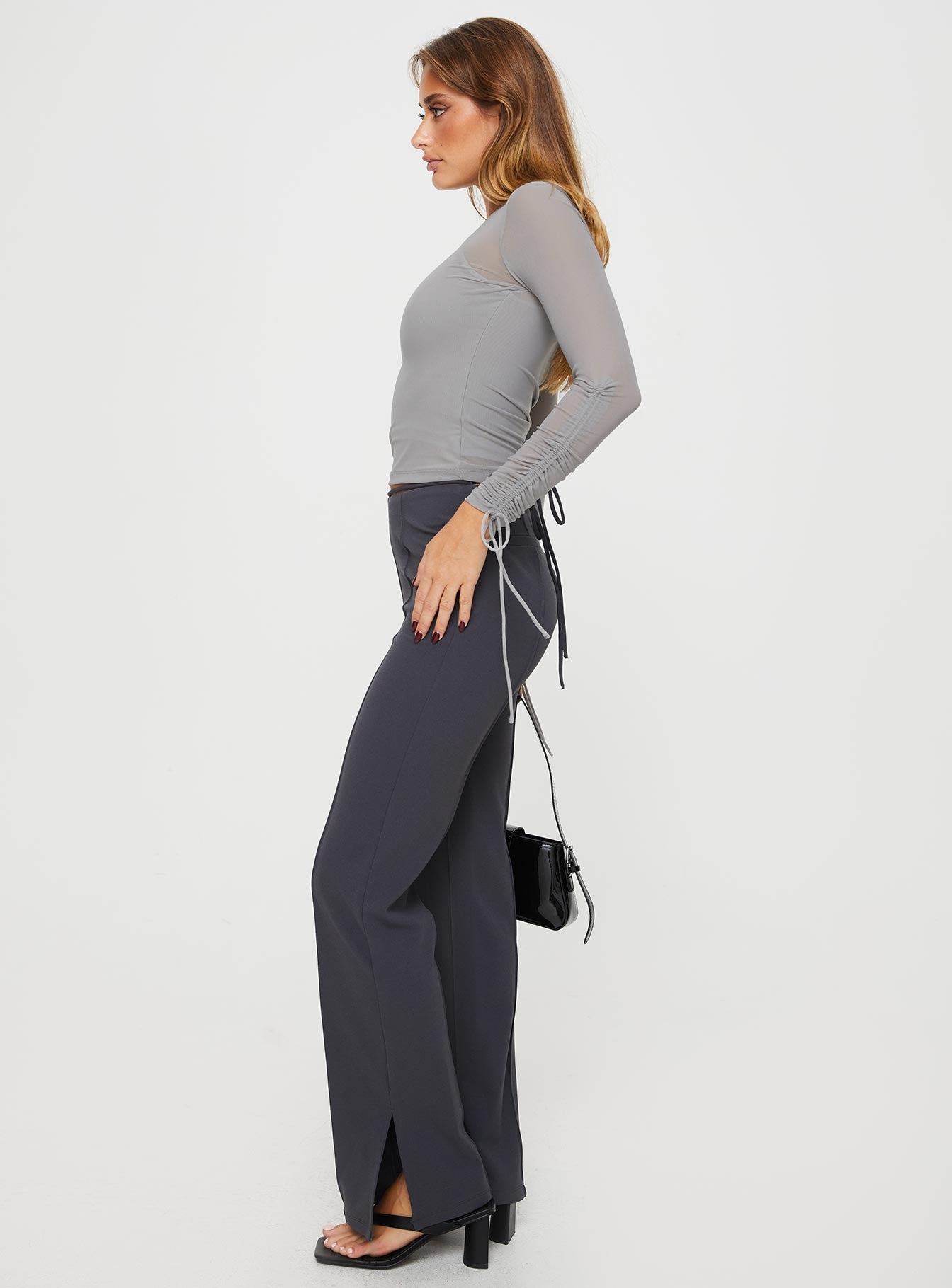 side view of model wearing Princess Polly Gerwig Pants Slate High Waisted Pants 