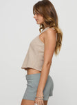 side view of model wearing Princess Polly Bronson Vest Top Beige Sleeveless V-Neck 