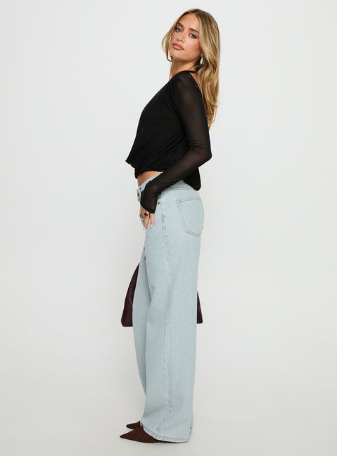 side view of model wearing Princess Polly Penny Mid Rise Straight Leg Jeans Light Denim Low Rise Jeans 