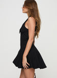 side view of model wearing Princess Polly Haworth Mini Dress Black Plunger 