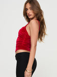 side view of model wearing Princess Polly Say It Loud Top Red Sleeveless Square Neck 