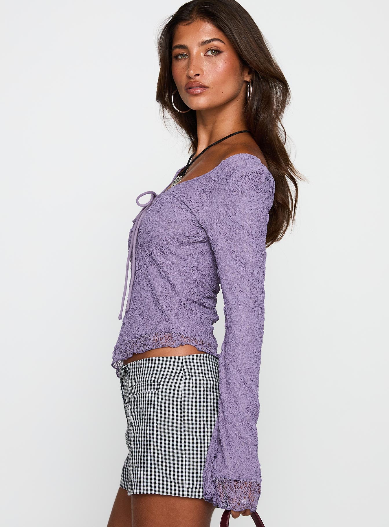 side view of model wearing Princess Polly Hyacinthe Long Sleeve Top Lilac Full Sleeves Scoop Neck 