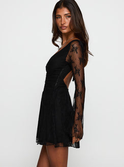 side view of model wearing Princess Polly Kateryna Long Sleeve Lace Mini Dress Black V-Neck 