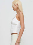 side view of model wearing Princess Polly Honey Honey Top White Sleeveless V-Neck 