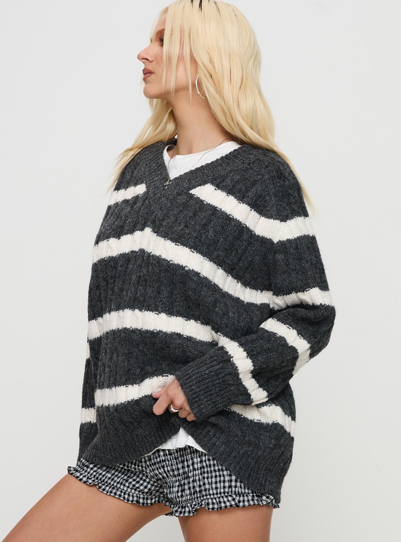side view of model wearing Princess Polly Percivill Knit Sweater Grey / Cream Long 